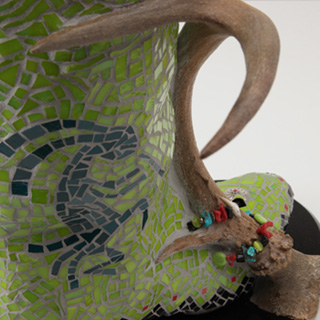 Kokopelli closeup of antler